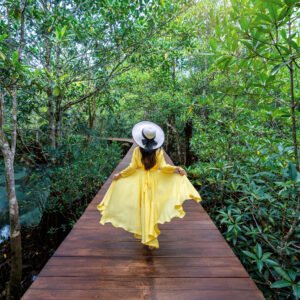 Woman walking in a nature park.